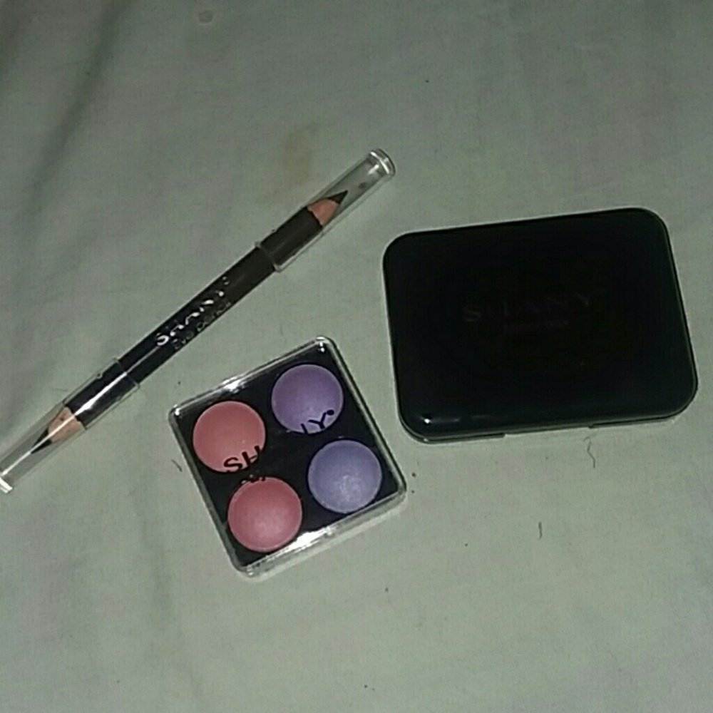 One eyeshadow palette eye pencil and mirror